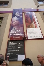 Posters hanging next to entrance of Galleria dell'Accademia.jpg