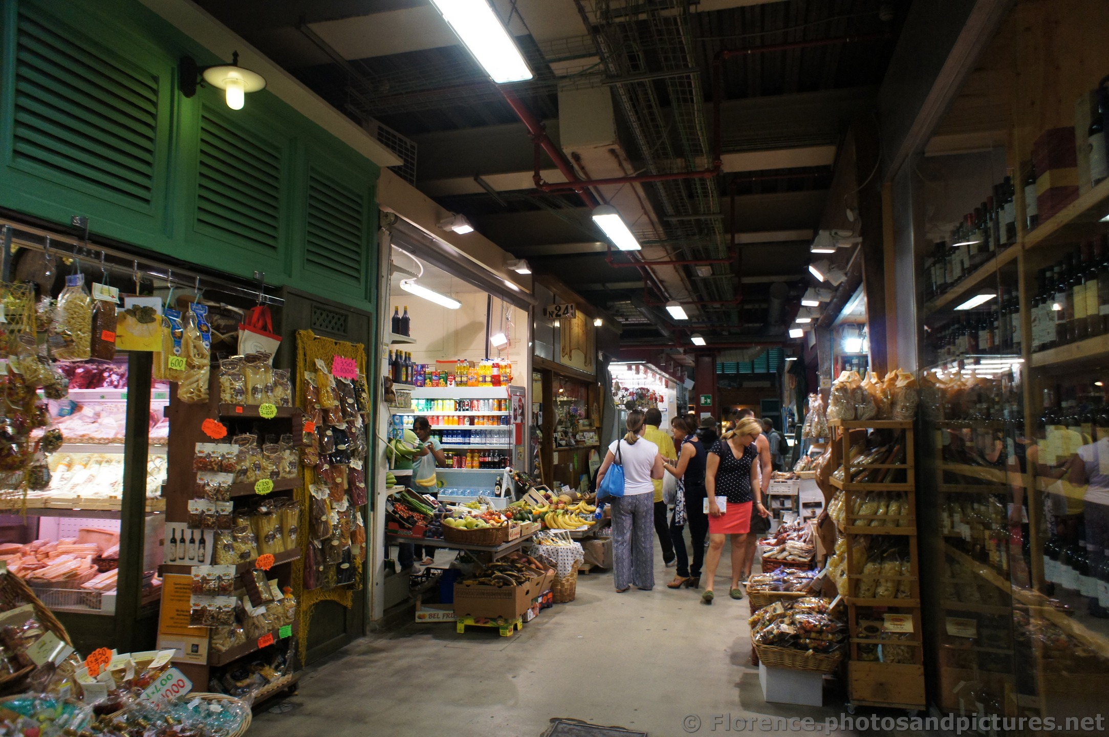 People Browsing the Aisles of Mercato Centrale Florence.jpg