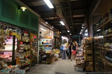 People Browsing the Aisles of Mercato Centrale Florence.jpg
