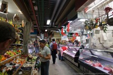 Fresh Meat and Fruit Shops Across from One Another at Florence Mercato Centrale.jpg