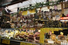 Busy displays of Meat and Sausages froma  Shop at Florence Central Market.jpg