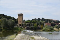 Divide of the Arno River with Porta San Niccolo in the background.jpg