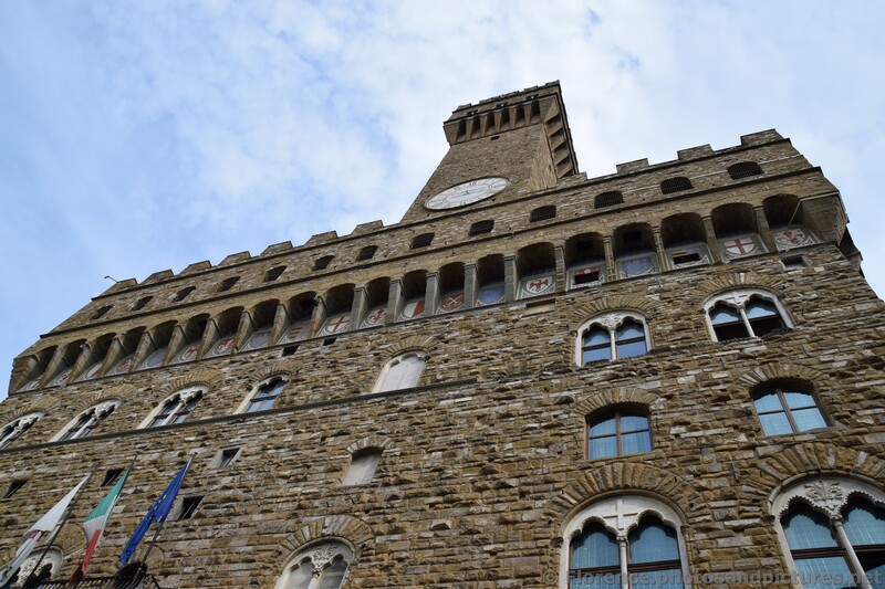 Looking up at Palazzo Vecchio & Its Tower.jpg