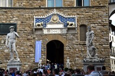 Entrance to Palazo Vecchio flanked by statue of Hercules & Cacus and David.jpg