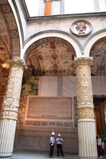 Frescoes and Intricate Gold and White Columns inside the First Courtyard of Palazzo Vecchio.jpg