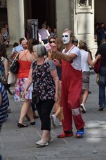 Jester Clown plays a prank on a woman near Piazza dell Signoria.jpg