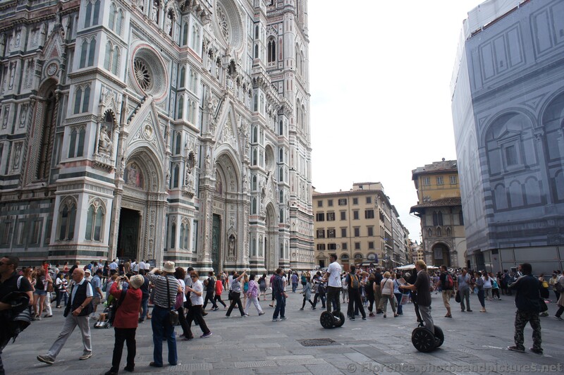 Tourists on Segways in front of the Duomo Florence.jpg